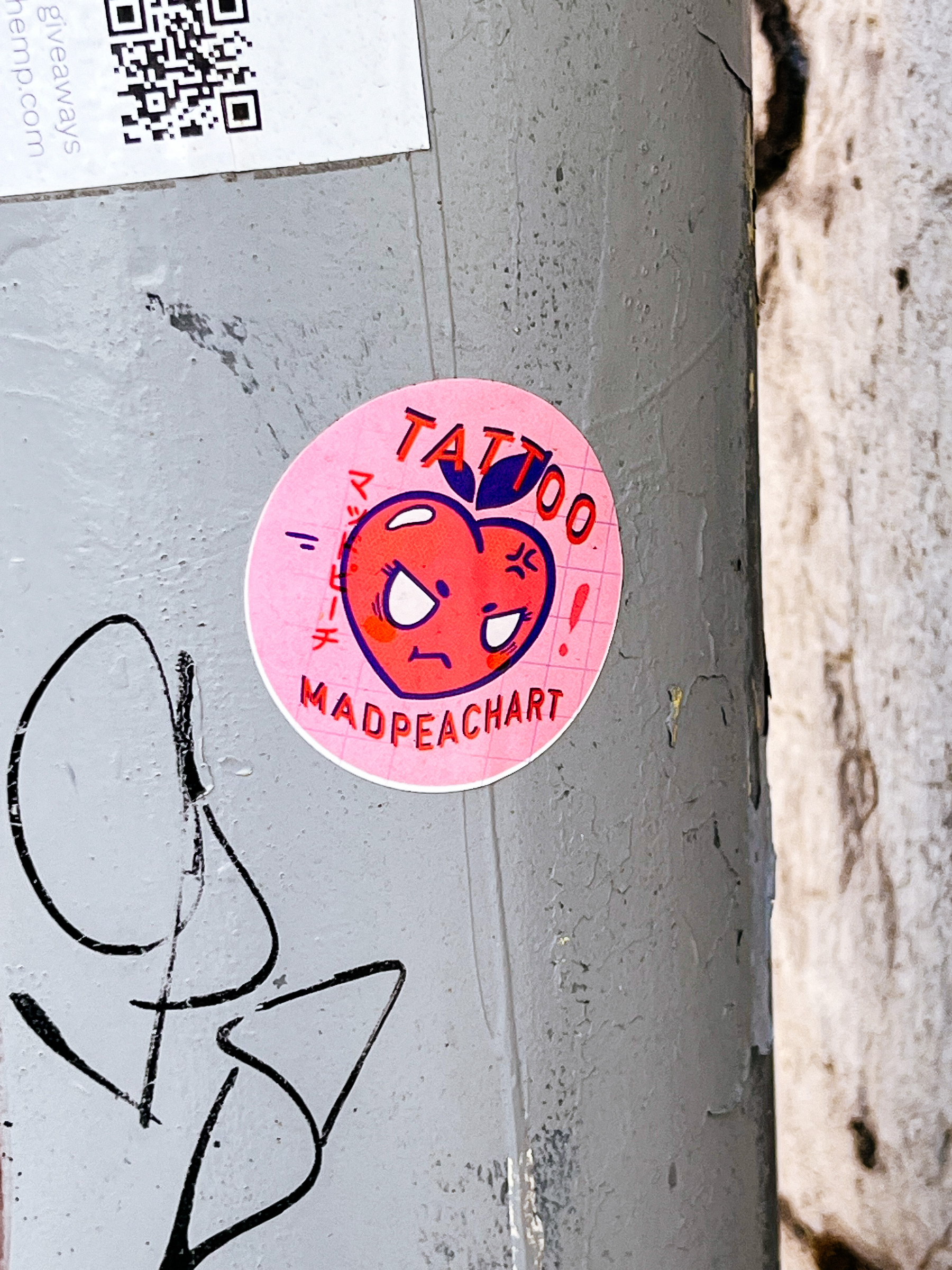 Sticker with a rough looking heart, and the words “Tattoo Madpeachart”.