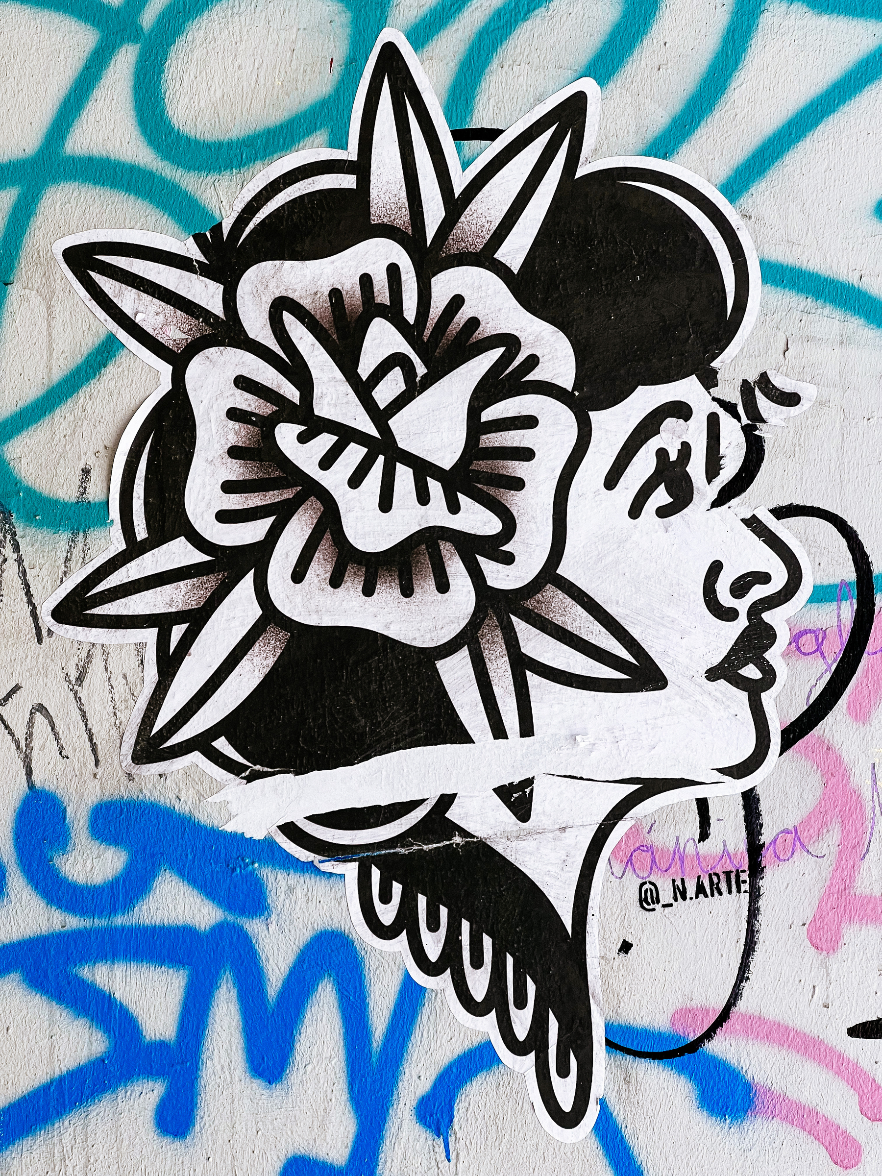Sticker with a tattoo like design, a woman with a flower in her head. 