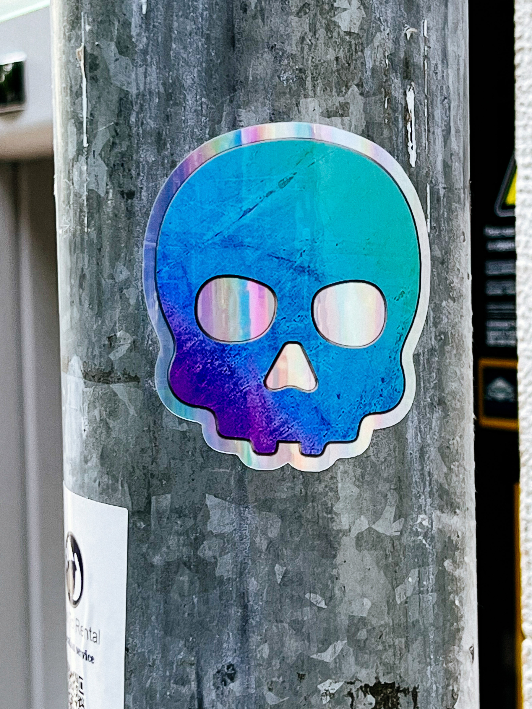 Sticker of a blue skull. 