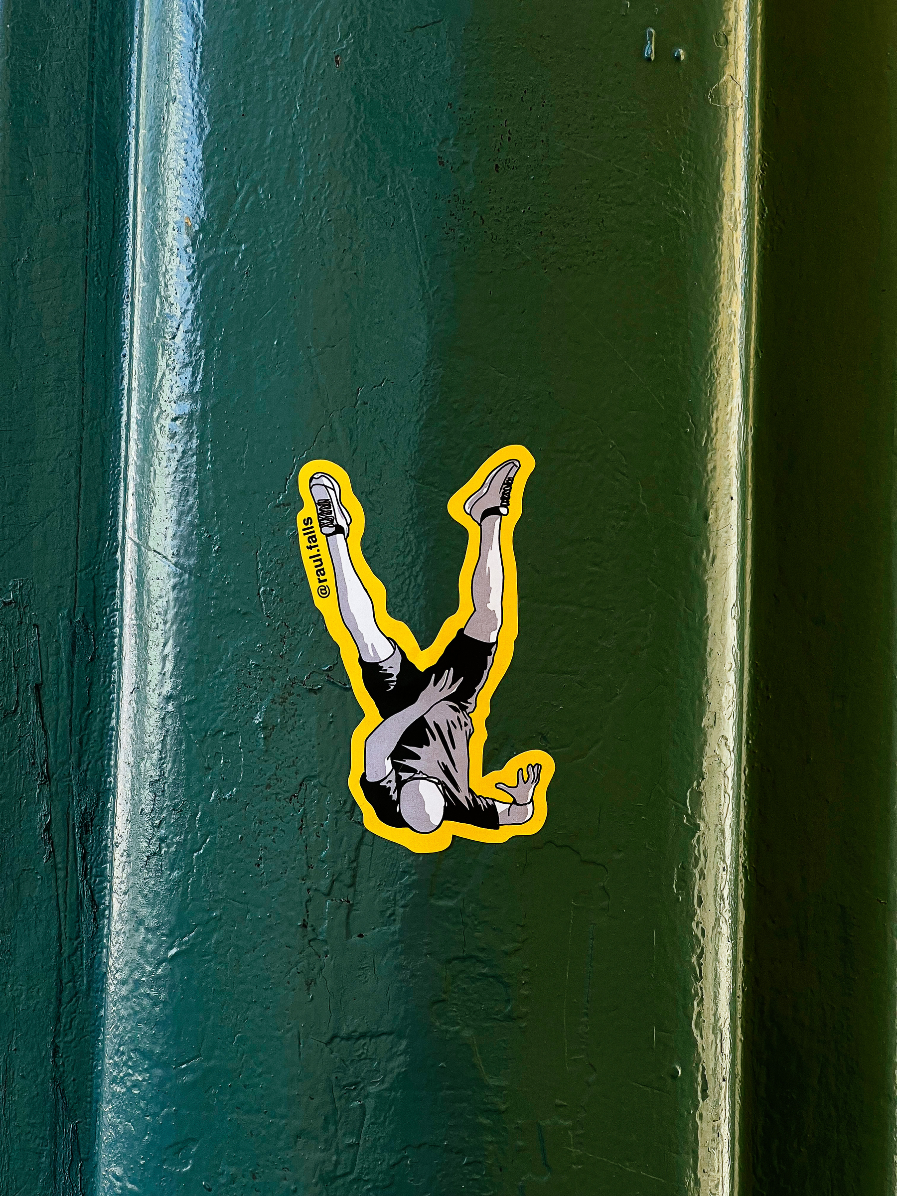 Sticker with a drawing of a man falling down. 