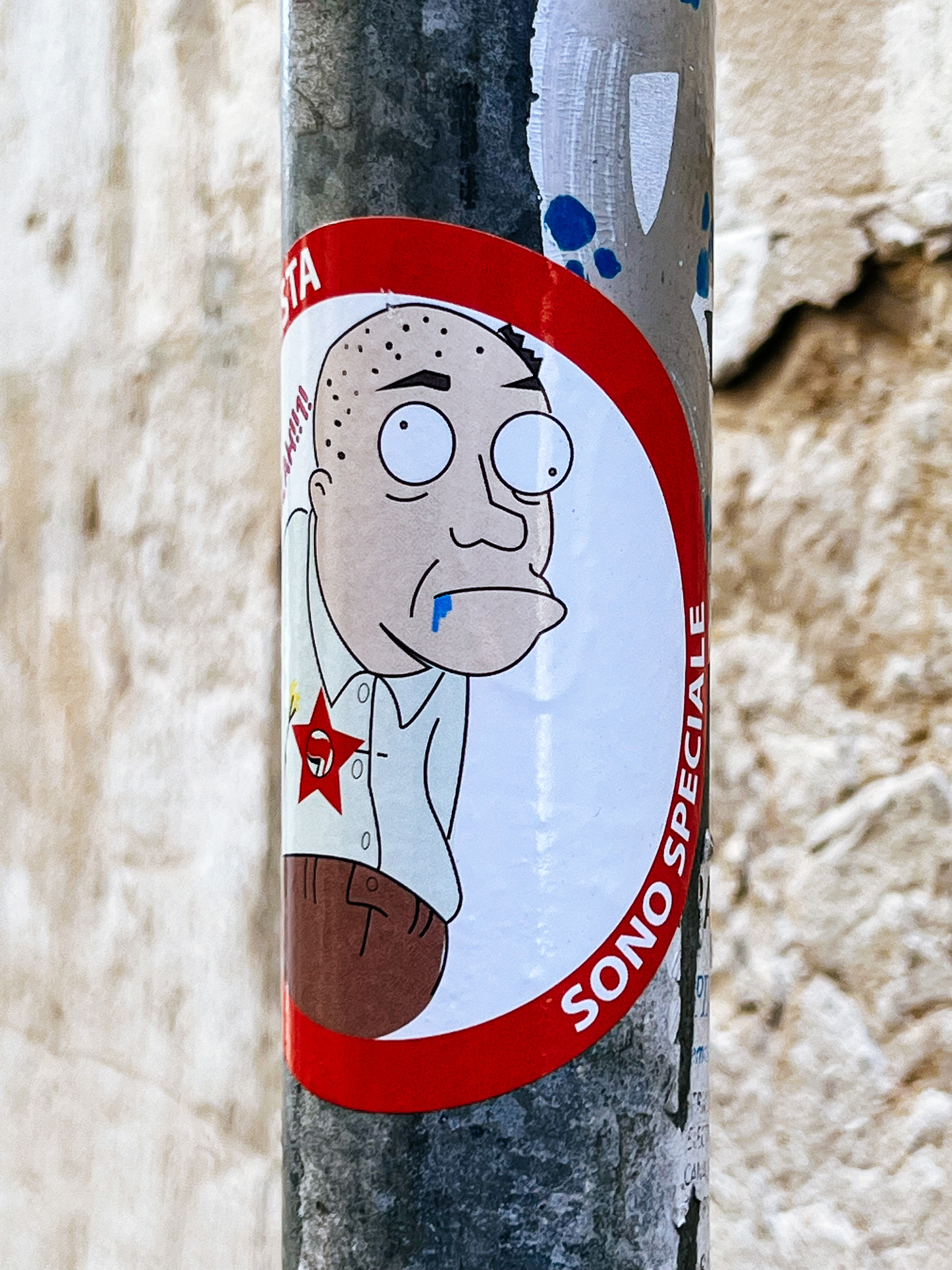 “Sono Speciale”, sticker with a drooling man. 