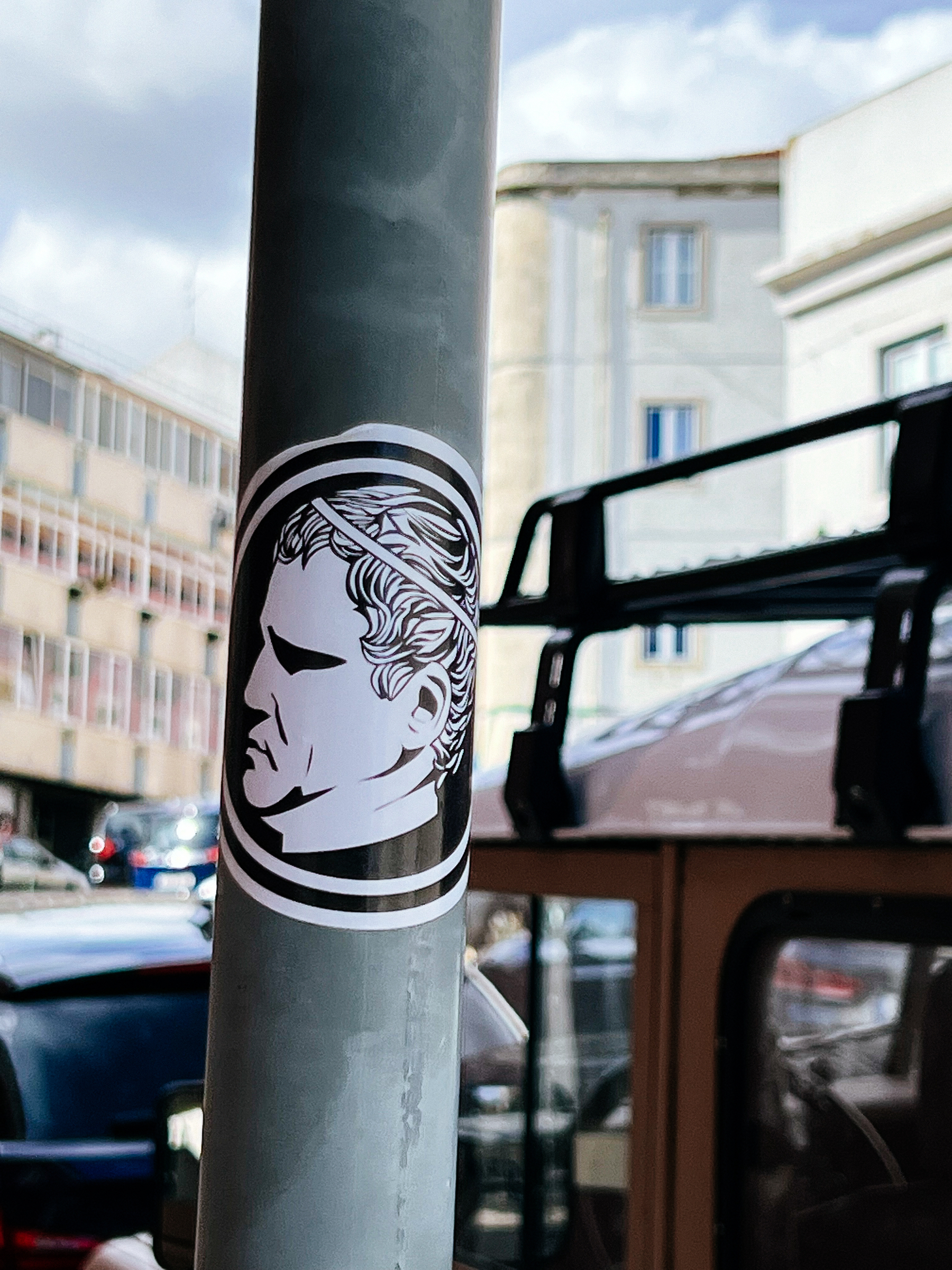 Sticker with what looks like a Roman emperor’s head. 