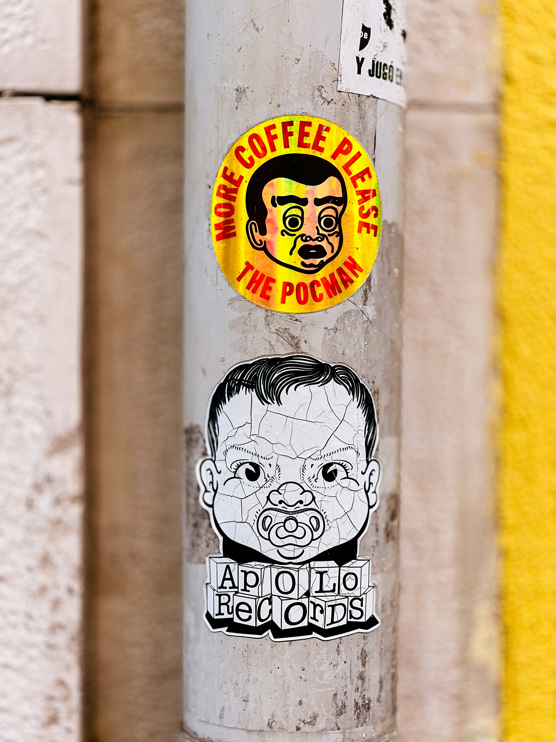 Two stickers, with two baby-faced characters. Text reads &ldquo;More Coffee Please/ The Pocman&rdquo; and &ldquo;Apollo Records&rdquo;. 