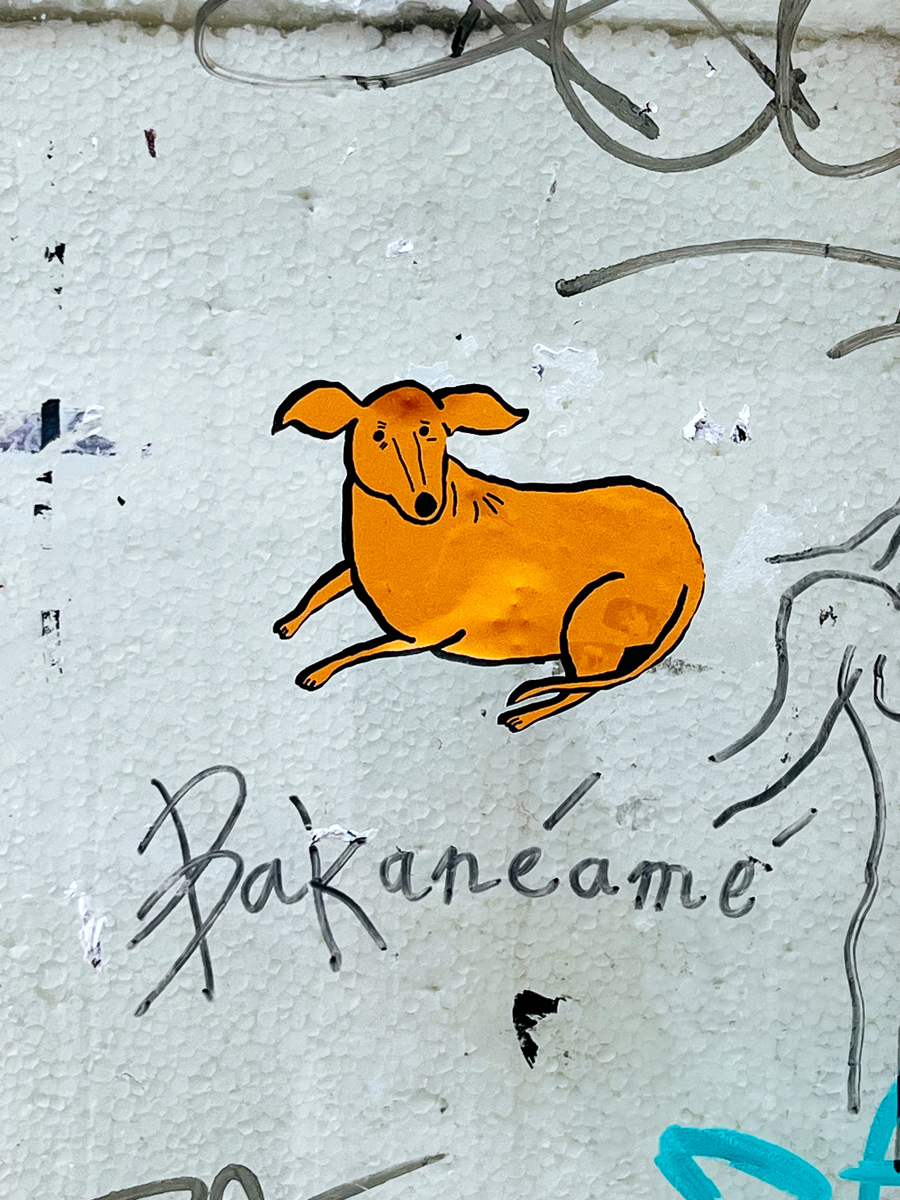 An orange dog. Sticker. 