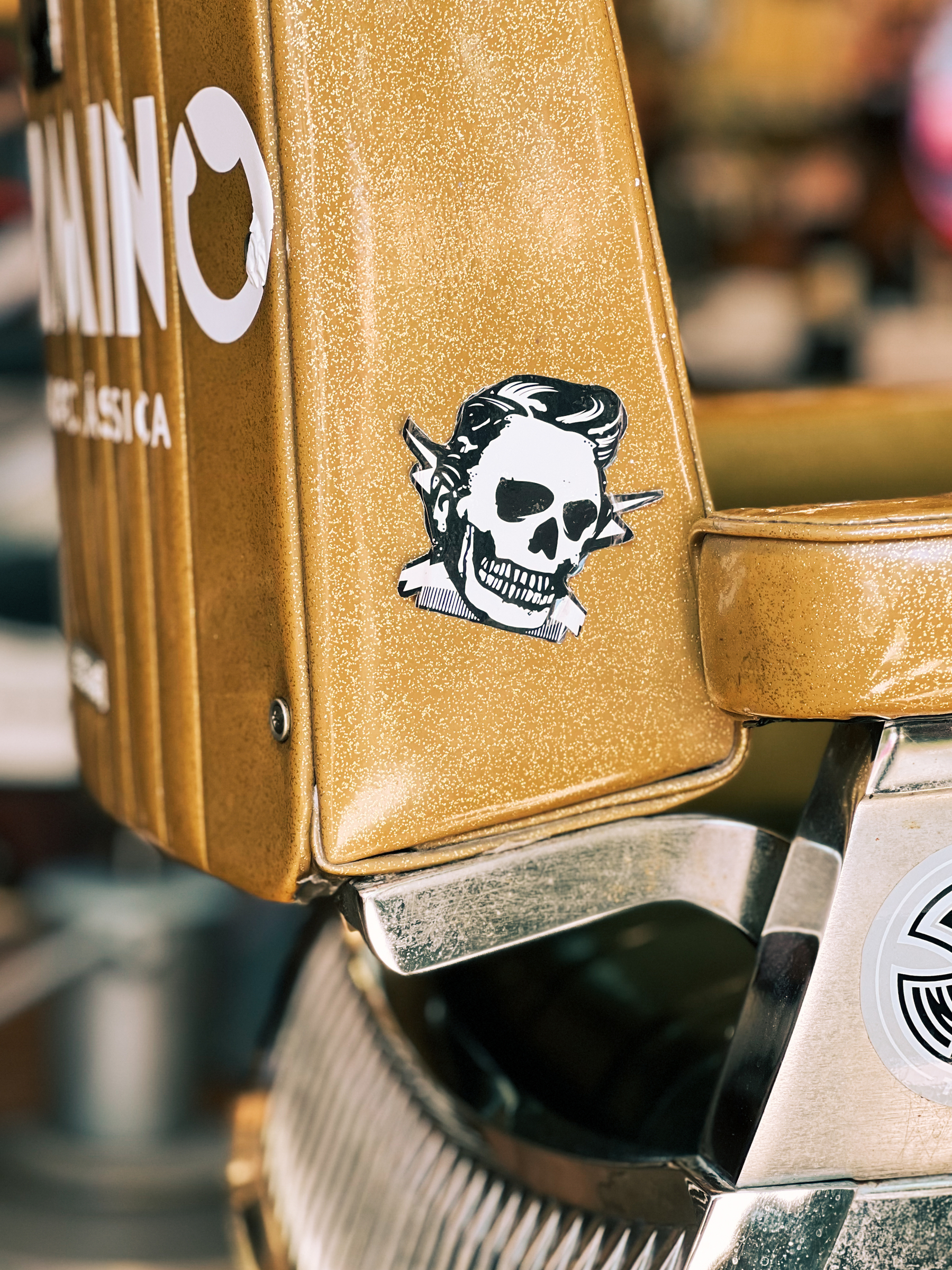 A skull with a nice haircut. Sticker on a barber’s chair. 
