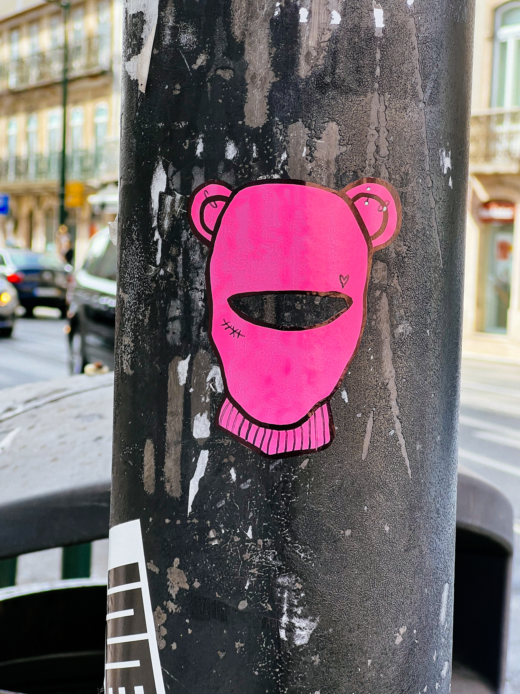 Pink balaclava with ears. Sticker. 